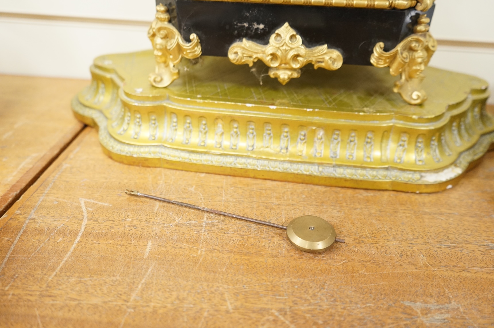 A 19th century French gilt metal mantel clock and stand, 56cm total